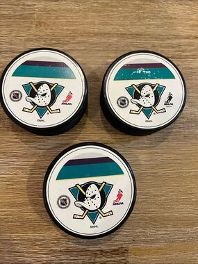 NHL Mighty Ducks Hockey Pucks